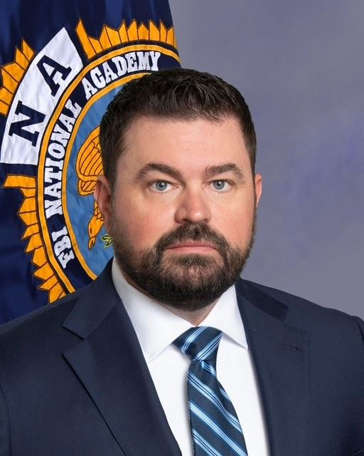 Paine FBINA Headshot (002)